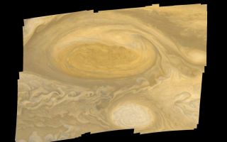 <h1>PIA00022:  Jupiter Great Red Spot Mosaic</h1><div class="PIA00022" lang="en" style="width:800px;text-align:left;margin:auto;background-color:#000;padding:10px;max-height:150px;overflow:auto;">This photo of Jupiter's Great Red Spot was taken by Voyager 1 in early March 1979. Distance from top to bottom of the picture is 15,000 miles (24,000 kilometers). Smallest features visible are about 20 miles (30 kilometers) across. The white feature below the Great Red Spot is one of several white ovals that were observed to form about 40 years ago; they move around Jupiter at a different velocity from the Red Spot. During the Voyager 1 encounter period, material was observed to revolve around the center of the spot with a period of six days. The Voyager project is managed for NASA's Office of Space Science by the Jet Propulsion Laboratory.<br /><br /><a href="http://photojournal.jpl.nasa.gov/catalog/PIA00022" onclick="window.open(this.href); return false;" title="Voir l'image 	 PIA00022:  Jupiter Great Red Spot Mosaic	  sur le site de la NASA">Voir l'image 	 PIA00022:  Jupiter Great Red Spot Mosaic	  sur le site de la NASA.</a></div>
