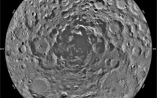 <h1>PIA00001:  South Pole Region of the Moon as Seen by Clementine</h1><div class="PIA00001" lang="en" style="width:800px;text-align:left;margin:auto;background-color:#000;padding:10px;max-height:150px;overflow:auto;"><p>Lunar mosaic of ~1500 Clementine images of the south polar region of the moon. The projection is orthographic, centered on the south pole. The Schrodinger Basin (320 km in diameter) is located in the lower right of the mosaic. Amundsen-Ganswindt is the more subdued circular basin between Schrodinger and the pole. The polar regions of the moon are of special interest because of the postulated occurrence of ice in permanently shadowed areas. The south pole is of greater interest because the area that remains in shadow is much larger than that at the north pole.<br /><br /><a href="http://photojournal.jpl.nasa.gov/catalog/PIA00001" onclick="window.open(this.href); return false;" title="Voir l'image 	 PIA00001:  South Pole Region of the Moon as Seen by Clementine	  sur le site de la NASA">Voir l'image 	 PIA00001:  South Pole Region of the Moon as Seen by Clementine	  sur le site de la NASA.</a></div>