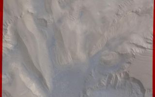 <h1>PIA00199:  Candor Chasm in Valles Marineris</h1><div class="PIA00199" lang="en" style="width:800px;text-align:left;margin:auto;background-color:#000;padding:10px;max-height:150px;overflow:auto;">Part of Candor Chasm in Valles Marineris, Mars, from about latitude -9 degrees to -3 degrees and longitude 69 degrees to 75 degrees. Layered terrain is visible in the scene, perhaps due to a huge ancient lake. The geomorphology is complex, shaped by tectonics, mass wasting, and wind, and perhaps by water and volcanism.<br /><br /><a href="http://photojournal.jpl.nasa.gov/catalog/PIA00199" onclick="window.open(this.href); return false;" title="Voir l'image 	 PIA00199:  Candor Chasm in Valles Marineris	  sur le site de la NASA">Voir l'image 	 PIA00199:  Candor Chasm in Valles Marineris	  sur le site de la NASA.</a></div>