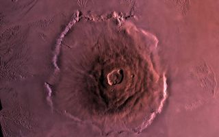 <h1>PIA00300:  Olympus Mons</h1><div class="PIA00300" lang="en" style="width:800px;text-align:left;margin:auto;background-color:#000;padding:10px;max-height:150px;overflow:auto;">Shown here is a digital mosaic of Olympus Mons, the largest known volcano in the Solar System. It is 27 kilometers high, over 600 kilometers at the base, and is surrounded by a well-defined scarp that is up to 6 km high. Lava flows drape over the scarp in places. Much of the plains surrounding the volcano are covered by the ridged and grooved 'aureole' of Olympus Mons. The origin of the aureole is controversial, but may be related to gravity sliding off of the flanks of an ancestral volcano. The summit caldera (central depression) is almost 3 km deep and 25 km across. It probably formed from recurrent collapse following drainage of magma resulting from flank eruptions.<br /><br /><a href="http://photojournal.jpl.nasa.gov/catalog/PIA00300" onclick="window.open(this.href); return false;" title="Voir l'image 	 PIA00300:  Olympus Mons	  sur le site de la NASA">Voir l'image 	 PIA00300:  Olympus Mons	  sur le site de la NASA.</a></div>