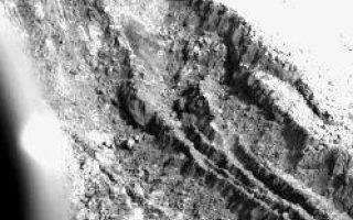 <h1>PIA00529:  VL1 Digs A Deep Hole On Mars</h1><div class="PIA00529" lang="en" style="width:249px;text-align:left;margin:auto;background-color:#000;padding:10px;max-height:150px;overflow:auto;">VIKING LANDER DIGS A DEEP HOLE ON MARS -- This six-inch-deep, 12- inch-wide, 29-inch-long hole was dug Feb. 12 and 14 by Viking Lander 1 as the first sequence in an attempt to reach a foot beneath the surface of the red planet. The activity is in the same area where Lander 1 acquired its first soil samples last July. The trench was dug by repeatedly backhoeing in a left-right-center pattern. The backhoe teeth produced the small parallel ridges at the far end of the trench (upper left). The larger ridges running the length of the trench are material left behind during the backhoe operation. What appears to be small rocks along the ridges and in the soil at the near end of the trench are really small dirt clods. The clods and the steepness of the trench walls indicate the material is cohesive and behaves something like ordinary flour. After a later sequence, to be performed March 1 and 2, a soil sample will be taken from the bottom of the trench for inorganic soil analysis and later for biology analysis. Information about the soil taken from the bottom of the trench may help explain the weathering process on Mars and may help resolve the dilemma created by Viking findings that first suggest but then cast doubt on the possibility of life in the Martian soil. The trench shown here is a result of one of the most complex command sequences yet performed by the lander. Viking l has been operating at Chryse Planitia on Mars since it landed July 20, 1976.<br /><br /><a href="http://photojournal.jpl.nasa.gov/catalog/PIA00529" onclick="window.open(this.href); return false;" title="Voir l'image 	 PIA00529:  VL1 Digs A Deep Hole On Mars	  sur le site de la NASA">Voir l'image 	 PIA00529:  VL1 Digs A Deep Hole On Mars	  sur le site de la NASA.</a></div>