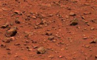 <h1>PIA00564:  Vivid Colors of the Viking Lander 1 Scene</h1><div class="PIA00564" lang="en" style="width:270px;text-align:left;margin:auto;background-color:#000;padding:10px;max-height:150px;overflow:auto;">Viking 1 obtained this color picture of the Martian surface and sky on July 24. Camera Number 1 facing southeast, captured part of the spacecraft's gray structure in the foreground. A bright orange cable leads to one of the descent rocket engines. Orange-red surface materials cover most of the surface, apparently forming a thin veneer over darker bedrock. A zone of large dark boulders is present in the far-field. The sky has a reddish cast, which is probably due to scattering and reflection from reddish sediment suspended in the lower atmosphere. This picture has been radiometrically calibrated, using information on camera performance acquired before launch. Although the colors are very vivid, the fidelity with which the bright orange cable is reproduced suggests that the intense colors of the Martian surface are, in fact, real.<br /><br /><a href="http://photojournal.jpl.nasa.gov/catalog/PIA00564" onclick="window.open(this.href); return false;" title="Voir l'image 	 PIA00564:  Vivid Colors of the Viking Lander 1 Scene	  sur le site de la NASA">Voir l'image 	 PIA00564:  Vivid Colors of the Viking Lander 1 Scene	  sur le site de la NASA.</a></div>
