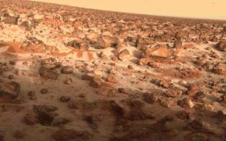 <h1>PIA00571:  Ice on Mars Utopia Planitia Again</h1><div class="PIA00571" lang="en" style="width:478px;text-align:left;margin:auto;background-color:#000;padding:10px;max-height:150px;overflow:auto;">This high-resolution color photo of the surface of Mars was taken by Viking Lander 2 at its Utopia Planitia landing site on May 18, 1979, and relayed to Earth by Orbiter 1 on June 7. It shows a thin coating of water ice on the rocks and soil. The time the frost appeared corresponds almost exactly with the buildup of frost one Martian year (23 Earth months) ago. Then it remained on the surface for about 100 days. Scientists believe dust particles in the atmosphere pick up bits of solid water. That combination is not heavy enough to settle to the ground. But carbon dioxide, which makes up 95 percent of the Martian atmosphere, freezes and adheres to the particles and they become heavy enough to sink. Warmed by the Sun, the surface evaporates the carbon dioxide and returns it to the atmosphere, leaving behind the water and dust. The ice seen in this picture, like that which formed one Martian year ago, is extremely thin, perhaps no more than one-thousandth of an inch thick.<br /><br /><a href="http://photojournal.jpl.nasa.gov/catalog/PIA00571" onclick="window.open(this.href); return false;" title="Voir l'image 	 PIA00571:  Ice on Mars Utopia Planitia Again	  sur le site de la NASA">Voir l'image 	 PIA00571:  Ice on Mars Utopia Planitia Again	  sur le site de la NASA.</a></div>