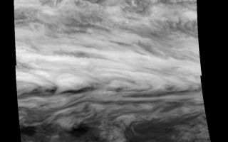<h1>PIA00843:  Jupiter's Belt-Zone Boundary (Methane filter, 732 nm)</h1><div class="PIA00843" lang="en" style="width:800px;text-align:left;margin:auto;background-color:#000;padding:10px;max-height:150px;overflow:auto;">Mosaic of a belt-zone boundary near Jupiter's equator. The images that make up the four quadrants of this mosaic were taken within a few minutes of each other and show Jupiter's appearance at 732 nanometers (nm). Sunlight at 732 nm is weakly absorbed by atmospheric methane. This absorption lowers the total amount of scattered light detected by the Galileo spacecraft while enhancing the fraction that comes from higher in Jupiter's atmosphere where less methane is present. The features of the lower ammonia cloud deck that are seen at 756 nm remain visible, but features in the higher, diffuse cloud are made more apparent.<p>The bowed shape of the clouds in the center of the image is created by a combination of stretching in the eastward direction by strong winds and stretching in the north-south direction by weaker winds. The precise shape of the bow and the eastward wind speeds can be measured. The north-south wind speeds, too small to be directly measured, then can be calculated. These images may provide the first indirect measurement of Jupiter's north-south winds.<p>The Jet Propulsion Laboratory, Pasadena, CA manages the mission for NASA's Office of Space Science, Washington, DC.<p>This image and other images and data received from Galileo are posted on the World Wide Web, on the Galileo mission home page at URL http://galileo.jpl.nasa.gov. Background information and educational context for the images can be found at <a href="http://www2.jpl.nasa.gov/galileo/sepo/" target="_blank">http://www.jpl.nasa.gov/galileo/sepo</a>..<br /><br /><a href="http://photojournal.jpl.nasa.gov/catalog/PIA00843" onclick="window.open(this.href); return false;" title="Voir l'image 	 PIA00843:  Jupiter's Belt-Zone Boundary (Methane filter, 732 nm)	  sur le site de la NASA">Voir l'image 	 PIA00843:  Jupiter's Belt-Zone Boundary (Methane filter, 732 nm)	  sur le site de la NASA.</a></div>