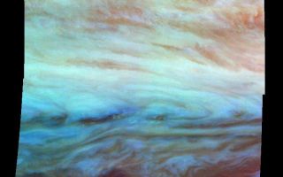 <h1>PIA01116:  False Color Mosaic of Jupiter's Belt-Zone Boundary</h1><div class="PIA01116" lang="en" style="width:800px;text-align:left;margin:auto;background-color:#000;padding:10px;max-height:150px;overflow:auto;">False-color mosaic of a belt-zone boundary near Jupiter's equator. The images that make up the four quadrants of this mosaic were taken within a few minutes of each other. Light at each of Galileo's three near-infrared wavelengths is displayed here mapped to the visible colors red, green, and blue. Light at 886 nanometers, strongly absorbed by atmospheric methane and scattered from clouds high in the atmosphere, is shown in red. Light at 732 nanometers, moderately absorbed by atmospheric methane, is shown in green. Light at 757 nanometers, scattered mostly from Jupiter's lower visible cloud deck, is shown in blue. The lower cloud deck appears bluish white, while the higher layer appears pinkish. The holes in the upper layer and their relationships to features in the lower cloud deck can be studied in the lower half of the mosaic. Galileo is the first spacecraft to image different layers in Jupiter's atmosphere.<p>North is at the top. The mosaic covers latitudes -13 to +3 degrees and is centered at longitude 282 degrees West. The smallest resolved features are tens of kilometers in size. These images were taken on November 5th, 1996, at a range of 1.2 million kilometers by the Solid State Imaging system aboard NASA's Galileo spacecraft.<p>The Jet Propulsion Laboratory, Pasadena, CA manages the mission for NASA's Office of Space Science, Washington, DC.<p>This image and other images and data received from Galileo are posted on the World Wide Web, on the Galileo mission home page at URL http://galileo.jpl.nasa.gov. Background information and educational context for the images can be found at <a href="http://www2.jpl.nasa.gov/galileo/sepo/" target="_blank">http://www.jpl.nasa.gov/galileo/sepo</a>..<br /><br /><a href="http://photojournal.jpl.nasa.gov/catalog/PIA01116" onclick="window.open(this.href); return false;" title="Voir l'image 	 PIA01116:  False Color Mosaic of Jupiter's Belt-Zone Boundary	  sur le site de la NASA">Voir l'image 	 PIA01116:  False Color Mosaic of Jupiter's Belt-Zone Boundary	  sur le site de la NASA.</a></div>
