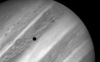 <h1>PIA01258:  Rare Hubble Portrait of Io and Jupiter</h1><div class="PIA01258" lang="en" style="width:720px;text-align:left;margin:auto;background-color:#000;padding:10px;max-height:150px;overflow:auto;"><p>This image, shows Jupiter's volcanic moon Io passing above the turbulent clouds of the giant planet, on July 24, 1996. The conspicuous black spot on Jupiter is Io's shadow. The shadow is about the size of Io (3,640 kilometers or 2,262 miles across) and sweeps across the face of Jupiter at 17 kilometers per second (38,000 miles per hour).<p>The smallest details visible on Io and Jupiter are about 100 miles across. Bright patches visible on Io are regions of sulfur dioxide frost. Io is roughly the size of Earth's moon, but 2,000 times farther away.<p>This one of a series of images of Io taken by Hubble to complement the close-up images currently being taken by the Galileo spacecraft now orbiting Jupiter. Though the Galileo images show much finer detail, Hubble provides complementary information because it can observe Io at ultraviolet wavelengths not seen by Galileo, can observe Io at different times than Galileo, and can view Io under more consistent viewing conditions.<p>The image was taken at violet wavelengths, with the Wide Field Planetary Camera 2, in PC mode.<p>This image and other images and data received from the Hubble Space Telescope are posted on the World Wide Web on the Space Telescope Science Institute home page at URL <a href="http://oposite.stsci.edu/" class="external free" target="wpext">http://oposite.stsci.edu/</a>.<br /><br /><a href="http://photojournal.jpl.nasa.gov/catalog/PIA01258" onclick="window.open(this.href); return false;" title="Voir l'image 	 PIA01258:  Rare Hubble Portrait of Io and Jupiter	  sur le site de la NASA">Voir l'image 	 PIA01258:  Rare Hubble Portrait of Io and Jupiter	  sur le site de la NASA.</a></div>