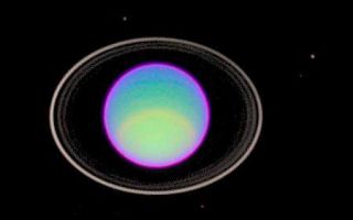 <h1>PIA01280:  Hubble Captures Detailed Image of Uranus' Atmosphere</h1><div class="PIA01280" lang="en" style="width:450px;text-align:left;margin:auto;background-color:#000;padding:10px;max-height:150px;overflow:auto;"><p>Hubble Space Telescope has peered deep into Uranus' atmosphere to see clear and hazy layers created by a mixture of gases. Using infrared filters, Hubble captured detailed features of three layers of Uranus' atmosphere.<p>Hubble's images are different from the ones taken by the Voyager 2 spacecraft, which flew by Uranus 10 years ago. Those images - not taken in infrared light - showed a greenish-blue disk with very little detail.<p>The infrared image allows astronomers to probe the structure of Uranus' atmosphere, which consists of mostly hydrogen with traces of methane. The red around the planet's edge represents a very thin haze at a high altitude. The haze is so thin that it can only be seen by looking at the edges of the disk, and is similar to looking at the edge of a soap bubble. The yellow near the bottom of Uranus is another hazy layer. The deepest layer, the blue near the top of Uranus, shows a clearer atmosphere.<p>Image processing has been used to brighten the rings around Uranus so that astronomers can study their structure. In reality, the rings are as dark as black lava or charcoal.<p>This false color picture was assembled from several exposures taken July 3, 1995 by the Wide Field Planetary Camera-2.<p>The Wide Field/Planetary Camera 2 was developed by the Jet Propulsion Laboratory and managed by the Goddard Space Flight Center for NASA's Office of Space Science.<p>This image and other images and data received from the Hubble Space Telescope are posted on the World Wide Web on the Space Telescope Science Institute home page at URL <a href="http://oposite.stsci.edu/" class="external free" target="wpext">http://oposite.stsci.edu/</a>.<br /><br /><a href="http://photojournal.jpl.nasa.gov/catalog/PIA01280" onclick="window.open(this.href); return false;" title="Voir l'image 	 PIA01280:  Hubble Captures Detailed Image of Uranus' Atmosphere	  sur le site de la NASA">Voir l'image 	 PIA01280:  Hubble Captures Detailed Image of Uranus' Atmosphere	  sur le site de la NASA.</a></div>