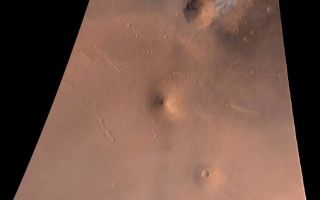 <h1>PIA01457:  Elysium Mons Volcanic Region</h1><div class="PIA01457" lang="en" style="width:800px;text-align:left;margin:auto;background-color:#000;padding:10px;max-height:150px;overflow:auto;">On July 4, 1998--the first anniversary of the Mars Pathfinder landing--Mars Global Surveyor's latest images were radioed to Earth with little fanfare. The images received on July 4, 1998, however, were very exciting because they included a rare crossing of the summit caldera of a major martian volcano. Elysium Mons is located at 25°N, 213°W, in the martian eastern hemisphere. Elysium Mons is one of three large volcanoes that occur on the Elysium Rise-- the others are Hecates Tholus (northeast of Elysium Mons) and Albor Tholus (southeast of Elysium Mons). The volcano rises about 12.5 kilometers (7.8 miles) above the surrounding plain, or about 16 kilometers (9.9 miles) above the martian datum-- the "zero" elevation defined by average martian atmospheric pressure and the planet's radius.<p>Elysium Mons was discovered by Mariner 9 in 1972. It differs in a number of ways from the familiar Olympus Mons and other large volcanoes in the Tharsis region. In particular, there are no obvious lava flows visible on the volcano's flanks. The lack of lava flows was apparent from the Mariner 9 images, but the new MOC high resolution image--obtained at 5.24 meters (17.2 feet) per pixel--illustrates that this is true even when viewed at higher spatial resolution.<p>Elysium Mons has many craters on its surface. Some of these probably formed by meteor impact, but many show no ejecta pattern characteristic of meteor impact. Some of the craters are aligned in linear patterns that are radial to the summit caldera--these most likely formed by collapse as lava was withdrawn from beneath the surface, rather than by meteor impact. Other craters may have formed by explosive volcanism. Evidence for explosive volcanism on Mars has been very difficult to identify from previous Mars spacecraft images. This and other MOC data are being examined closely to better understand the nature and origin of volcanic features on Mars.<p>The three MOC images, 40301 (red wide angle), 40302 (blue wide angle), and 40303 (high resolution, narrow angle) were obtained on Mars Global Surveyor's 403rd orbit around the planet around 9:58 - 10:05 p.m. PDT on July 2, 1998. The images were received and processed at Malin Space Science Systems (MSSS) around 4:00 p.m. PDT on July 4, 1998.<p>This image: Elysium Volcanic Region as seen by MOC on July 2, 1998. Volcano near top center is Hecates Tholus--note bright clouds off its northeast flank. Volcano near center is Elysium Mons; volcano toward lower right is Albor Tholus. Red channel is MOC red wide angle image 40301, the blue channel is MOC blue wide angle image 40302, and the green channel is synthesized by averaging the red and blue bands. Image is an orthographic projection centered at 24.85°N, 213.25°W. The scale at the center of the projection is 4.65 kilometers (2.9 miles) per pixel. North is up, illumination is from the lower right.<p>Malin Space Science Systems and the California Institute of Technology built the MOC using spare hardware from the Mars Observer mission. MSSS operates the camera from its facilities in San Diego, CA. The Jet Propulsion Laboratory's Mars Surveyor Operations Project operates the Mars Global Surveyor spacecraft with its industrial partner, Lockheed Martin Astronautics, from facilities in Pasadena, CA and Denver, CO.<br /><br /><a href="http://photojournal.jpl.nasa.gov/catalog/PIA01457" onclick="window.open(this.href); return false;" title="Voir l'image 	 PIA01457:  Elysium Mons Volcanic Region	  sur le site de la NASA">Voir l'image 	 PIA01457:  Elysium Mons Volcanic Region	  sur le site de la NASA.</a></div>