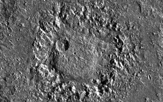 <h1>PIA01658:  Dome crater Neith on Jupiter's satellite Ganymede</h1><div class="PIA01658" lang="en" style="width:590px;text-align:left;margin:auto;background-color:#000;padding:10px;max-height:150px;overflow:auto;"><p>This image shows crater Neith, an unusual impact structure about 160 km (100 miles) in diameter, situated on Jupiter's largest satellite, Ganymede. Impact features like Neith have been called "penepalimpsests" by some investigators or "dome craters" by others and are considered to be transitional between craters and palimpsests. Palimpsests are bright, nearly circular patches that are believed to be remnant impact features. They occur also on Callisto, Ganymede's neighbor farther distant from Jupiter.</p><p>Four images of Neith were obtained under low sun elevation in April 1997 during Galileo's 7th orbit around Jupiter with the Solid State Imaging (SSI) system from a distance of about 15,500 km (9,600 miles) to produce this mosaic. The pixel resolution is about 150 m/pixel - the smallest features that are still discernible are about 300 m across. The sun illuminates the scene from the right. North is approximately pointing towards the top of the mosaic. Neith is situated at about 29 degrees northern latitude and 9 degrees western longitude on Ganymede.</p><p>The most striking feature in Neith is a large, circular dome about 45 km in diameter. The dome is surrounded by a wreath of rugged terrain. The wreath does not represent the original crater rim but the rim of a large central pit instead. The rim itself is barely visible and is located along the outer boundary of a relatively smooth, circular area, assumed to be the crater floor, which in turn surrounds the wreath of rugged terrain. In some parts along the rim, inward-facing scarps may be seen. The rim is not circular but appears to be petal-shaped. Outside the rim, a continuous ejecta blanket may be discerned.</p><p>The morphology of impact features such as Neith results either from the response of a relatively weak target material to a high-energy impact or from long-term viscous relaxation of the surface subsequent to impact.</p><p>Absolute ages derived from crater frequency measurements are model-dependent. In one crater chronology model, based on impacts dominated by asteroids, Neith may be old and very likely was formed during a period of more intense bombardment than today, about 3.9 billion years ago. In a different model, based on impacts preferentially by comets with a more or less constant impact rate, Neith may be only about 1 billion years old.</p><p>The Jet Propulsion Laboratory, Pasadena, CA manages the Galileo mission for NASA's Office of Space Science, Washington, DC.</p><p>This image and other images and data received from Galileo are posted on the World Wide Web, on the Galileo mission home page at URL <a href="http://solarsystem.nasa.gov/galileo/" target="_blank">http://solarsystem.nasa.gov/galileo/</a>. Background information and educational context for the images can be found at URL <a href="http://www2.jpl.nasa.gov/galileo/sepo/" target="_blank">http://www.jpl.nasa.gov/galileo/sepo</a><br /><br /><a href="http://photojournal.jpl.nasa.gov/catalog/PIA01658" onclick="window.open(this.href); return false;" title="Voir l'image 	 PIA01658:  Dome crater Neith on Jupiter's satellite Ganymede	  sur le site de la NASA">Voir l'image 	 PIA01658:  Dome crater Neith on Jupiter's satellite Ganymede	  sur le site de la NASA.</a></div>