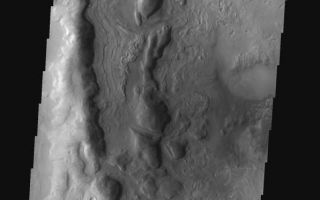 <h1>PIA01868:  Terra Sabaea</h1><div class="PIA01868" lang="en" style="width:597px;text-align:left;margin:auto;background-color:#000;padding:10px;max-height:150px;overflow:auto;"><p><a href="/figures/PIA01868_fig1.jpg"></a><br><b>Context image for PIA01868<br />Terra Sabaea</b></p><p>This old crater in Terra Sabaea has patterned floor material that is indicative of having a volitile component. At high latitudes the volitile is most likely ice.<p>Image information: VIS instrument. Latitude 42.5N, Longitude 66.8E. 19 meter/pixel resolution.</p><p>Please see the <a href="http://themis.asu.edu/terms" target="_blank">THEMIS Data Citation Note</a> for details on crediting THEMIS images.</p><p>Note: this THEMIS visual image has not been radiometrically nor geometrically calibrated for this preliminary release. An empirical correction has been performed to remove instrumental effects. A linear shift has been applied in the cross-track and down-track direction to approximate spacecraft and planetary motion. Fully calibrated and geometrically projected images will be released through the Planetary Data System in accordance with Project policies at a later time.</p><p>NASA's Jet Propulsion Laboratory manages the 2001 Mars Odyssey mission for NASA's Office of Space Science, Washington, D.C. The Thermal Emission Imaging System (THEMIS) was developed by Arizona State University, Tempe, in collaboration with Raytheon Santa Barbara Remote Sensing. The THEMIS investigation is led by Dr. Philip Christensen at Arizona State University. Lockheed Martin Astronautics, Denver, is the prime contractor for the Odyssey project, and developed and built the orbiter. Mission operations are conducted jointly from Lockheed Martin and from JPL, a division of the California Institute of Technology in Pasadena.</p><br /><br /><a href="http://photojournal.jpl.nasa.gov/catalog/PIA01868" onclick="window.open(this.href); return false;" title="Voir l'image 	 PIA01868:  Terra Sabaea	  sur le site de la NASA">Voir l'image 	 PIA01868:  Terra Sabaea	  sur le site de la NASA.</a></div>