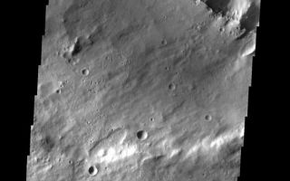 <h1>PIA01873:  Kasei Landslide</h1><div class="PIA01873" lang="en" style="width:586px;text-align:left;margin:auto;background-color:#000;padding:10px;max-height:150px;overflow:auto;"><p><a href="/figures/PIA01873_fig1.jpg"></a><br><b>Context image for PIA01873<br />Kasei Landslide</b></p><p>This landslide was formed when part of the channel wall collapsed. This image shows part of Kasei Vallis.<p>Image information: VIS instrument. Latitude 27.9N, Longitude 303.6E. 19 meter/pixel resolution.</p><p>Please see the <a href="http://themis.asu.edu/terms" target="_blank">THEMIS Data Citation Note</a> for details on crediting THEMIS images.</p><p>Note: this THEMIS visual image has not been radiometrically nor geometrically calibrated for this preliminary release. An empirical correction has been performed to remove instrumental effects. A linear shift has been applied in the cross-track and down-track direction to approximate spacecraft and planetary motion. Fully calibrated and geometrically projected images will be released through the Planetary Data System in accordance with Project policies at a later time.</p><p>NASA's Jet Propulsion Laboratory manages the 2001 Mars Odyssey mission for NASA's Office of Space Science, Washington, D.C. The Thermal Emission Imaging System (THEMIS) was developed by Arizona State University, Tempe, in collaboration with Raytheon Santa Barbara Remote Sensing. The THEMIS investigation is led by Dr. Philip Christensen at Arizona State University. Lockheed Martin Astronautics, Denver, is the prime contractor for the Odyssey project, and developed and built the orbiter. Mission operations are conducted jointly from Lockheed Martin and from JPL, a division of the California Institute of Technology in Pasadena.</p><br /><br /><a href="http://photojournal.jpl.nasa.gov/catalog/PIA01873" onclick="window.open(this.href); return false;" title="Voir l'image 	 PIA01873:  Kasei Landslide	  sur le site de la NASA">Voir l'image 	 PIA01873:  Kasei Landslide	  sur le site de la NASA.</a></div>