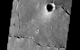 <h1>PIA01935:  Collapse Features</h1><div class="PIA01935" lang="en" style="width:579px;text-align:left;margin:auto;background-color:#000;padding:10px;max-height:150px;overflow:auto;"><p><a href="/figures/PIA01935_fig1.jpg"></a><br><b>Context image for PIA01935<br />Collapse Features</b></p><p>The collapse features in this images are related to lava tubes that likely originated at Elysium volcanic complex.</p><p>Image information: VIS instrument. Latitude 20.8N, Longitude 122.5E. 1 meter/pixel resolution.</p><p>Please see the <a href="http://themis.asu.edu/terms" target="_blank">THEMIS Data Citation Note</a> for details on crediting THEMIS images.</p><p>Note: this THEMIS visual image has not been radiometrically nor geometrically calibrated for this preliminary release. An empirical correction has been performed to remove instrumental effects. A linear shift has been applied in the cross-track and down-track direction to approximate spacecraft and planetary motion. Fully calibrated and geometrically projected images will be released through the Planetary Data System in accordance with Project policies at a later time.</p><p>NASA's Jet Propulsion Laboratory manages the 2001 Mars Odyssey mission for NASA's Office of Space Science, Washington, D.C. The Thermal Emission Imaging System (THEMIS) was developed by Arizona State University, Tempe, in collaboration with Raytheon Santa Barbara Remote Sensing. The THEMIS investigation is led by Dr. Philip Christensen at Arizona State University. Lockheed Martin Astronautics, Denver, is the prime contractor for the Odyssey project, and developed and built the orbiter. Mission operations are conducted jointly from Lockheed Martin and from JPL, a division of the California Institute of Technology in Pasadena.</p><br /><br /><a href="http://photojournal.jpl.nasa.gov/catalog/PIA01935" onclick="window.open(this.href); return false;" title="Voir l'image 	 PIA01935:  Collapse Features	  sur le site de la NASA">Voir l'image 	 PIA01935:  Collapse Features	  sur le site de la NASA.</a></div>