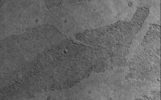 <h1>PIA02010:  Marte Vallis Textures</h1><div class="PIA02010" lang="en" style="width:632px;text-align:left;margin:auto;background-color:#000;padding:10px;max-height:150px;overflow:auto;"><p>20 March 2006<br />This Mars Global Surveyor (MGS) Mars Orbiter Camera (MOC) image shows platy flow surfaces in the Marte Vallis region of Mars. The origin of the flows is not well-understood, but as some Mars scientists have suggested, the flows may be the product of low viscosity (very fluid), high temperature volcanic eruptions, or perhaps they are the remains of large-scale mud flows. In either case, the materials are solid and hold a record of small meteor impact craters, thus indicating that they are not composed of ice, as still others have speculated.</p><p>Location near: 6.7°N, 182.0°W <br />Image width: ~3 km (~1.9 mi) <br />Illumination from: lower left <br />Season: Northern Winter </p><br /><br /><a href="http://photojournal.jpl.nasa.gov/catalog/PIA02010" onclick="window.open(this.href); return false;" title="Voir l'image 	 PIA02010:  Marte Vallis Textures	  sur le site de la NASA">Voir l'image 	 PIA02010:  Marte Vallis Textures	  sur le site de la NASA.</a></div>
