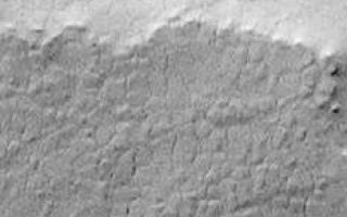 <h1>PIA02020:  South Melea Planum, By The Dawn's Early Light</h1><div class="PIA02020" lang="en" style="width:233px;text-align:left;margin:auto;background-color:#000;padding:10px;max-height:150px;overflow:auto;"><p>MOC "sees" by the dawn's early light! This picture was taken over the high southern polar latitudes during the first week of May 1999. The area shown is currently in southern winter darkness. Because sunlight is scattered over the horizon by aerosols--dust and ice particles--suspended in the atmosphere, sufficient light reaches regions within a few degrees of the terminator (the line dividing night and day) to be visible to the Mars Global Surveyor Mars Orbiter Camera (MOC) when the maximum exposure settings are used.</p><p>This picture shows a polygonally-patterned surface on southern Malea Planum. At the time the picture was taken, the sun was more than 4.5° below the northern horizon. The scene covers an area 3 kilometers (1.9 miles) wide, with the illumination from the top of the picture.</p><p>In this frame, the surface appears a relatively uniform gray. At the time the picture was acquired, the surface was covered with south polar wintertime frost. The highly reflective frost, in fact, may have contributed to the increased visibility of this surface.</p><p>This "twilight imaging" technique for viewing Mars can only work near the terminator; thus in early May only regions between about 67°S and 74°S were visible in twilight images in the southern hemisphere, and a similar narrow latitude range could be imaged in the northern hemisphere. MOC cannot "see" in the total darkness of full-borne night.</p><p>Malin Space Science Systems and the California Institute of Technology built the MOC using spare hardware from the Mars Observer mission. MSSS operates the camera from its facilities in San Diego, CA. The Jet Propulsion Laboratory's Mars Surveyor Operations Project operates the Mars Global Surveyor spacecraft with its industrial partner, Lockheed Martin Astronautics, from facilities in Pasadena, CA and Denver, CO.</p><br /><br /><a href="http://photojournal.jpl.nasa.gov/catalog/PIA02020" onclick="window.open(this.href); return false;" title="Voir l'image 	 PIA02020:  South Melea Planum, By The Dawn's Early Light	  sur le site de la NASA">Voir l'image 	 PIA02020:  South Melea Planum, By The Dawn's Early Light	  sur le site de la NASA.</a></div>