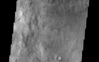 <h1>PIA02032:  Crater Floor</h1><div class="PIA02032" lang="en" style="width:557px;text-align:left;margin:auto;background-color:#000;padding:10px;max-height:150px;overflow:auto;"><p><a href="/figures/PIA02032_fig1.jpg"></a><br><b>Context image for PIA02032<br />Crater Floor</b></p><p>This crater and its interesting floor features is located south of Meridiani Terra.<p>Image information: VIS instrument. Latitude -5.1N, Longitude 354.8E. 18 meter/pixel resolution.</p><p>Please see the <a href="http://themis.asu.edu/terms" target="_blank">THEMIS Data Citation Note</a> for details on crediting THEMIS images. </p><p>Note: this THEMIS visual image has not been radiometrically nor geometrically calibrated for this preliminary release. An empirical correction has been performed to remove instrumental effects. A linear shift has been applied in the cross-track and down-track direction to approximate spacecraft and planetary motion. Fully calibrated and geometrically projected images will be released through the Planetary Data System in accordance with Project policies at a later time.</p><p>NASA's Jet Propulsion Laboratory manages the 2001 Mars Odyssey mission for NASA's Office of Space Science, Washington, D.C. The Thermal Emission Imaging System (THEMIS) was developed by Arizona State University, Tempe, in collaboration with Raytheon Santa Barbara Remote Sensing. The THEMIS investigation is led by Dr. Philip Christensen at Arizona State University. Lockheed Martin Astronautics, Denver, is the prime contractor for the Odyssey project, and developed and built the orbiter. Mission operations are conducted jointly from Lockheed Martin and from JPL, a division of the California Institute of Technology in Pasadena.</p><br /><br /><a href="http://photojournal.jpl.nasa.gov/catalog/PIA02032" onclick="window.open(this.href); return false;" title="Voir l'image 	 PIA02032:  Crater Floor	  sur le site de la NASA">Voir l'image 	 PIA02032:  Crater Floor	  sur le site de la NASA.</a></div>
