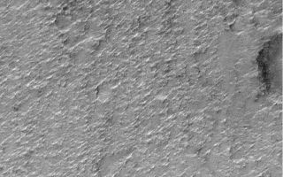 <h1>PIA02064:  MOC Providing Clues For Future Landing Site Selection</h1><div class="PIA02064" lang="en" style="width:754px;text-align:left;margin:auto;background-color:#000;padding:10px;max-height:150px;overflow:auto;"><p></p><p>One of the original objectives of the Mars Orbiter Camera (MOC) when it was proposed to NASA in 1985 was to take pictures that would be used to assess future spacecraft landing sites. Images obtained by the Mars Global Surveyor (MGS) MOC since March 1999 provide the highest resolution views (1.5 to 4.5 meters (5-15 ft) per pixel) of the planet ever seen. Over the past several months, MOC science personnel have been examining these new data to develop a general view of what Mars is like at the meter-scale within the general latitude and elevation range that will be accessible to the <a href="http://marsweb.jpl.nasa.gov/2001/index.html">Mars Surveyor 2001 lander</a>. (i.e., about 5°N to 15°S latitude and lower than 2.5 km (1.6 mi) elevation).</p><p>Because MOC images only cover a tiny fraction of one percent of the surface of Mars, we have been seeking general correlations that exist between what is seen in a MOC high-resolution image and what can be seen in the lower-resolution Viking and Mariner 9 images taken in 1972 and 1976-1980.</p><p>The most important results thus far are illustrated in the four pictures above. Nearly 70% of the terrain examined follows two very simple, but unexpected "rules" -- (1) If the terrain appears rugged at the hundreds of meters to kilometers scale in a Viking or Mariner image, then it will appear smooth at the meter-scale in a MOC image. (2) If the terrain appears to be smooth in the Viking or Mariner image, it will be rough in the meter-scale MOC image.</p><p>The image pair above illustrates the second "rule." Areas that appear to be smooth in the Viking and Mariner images--as in MOC2-138a (left)--tend to look quite rough at the meter scale in MOC images like MOC2-138b (right). The rough texture in this particular case was probably cause by wind erosion.</p><p>The Viking image shown here is illuminated from the upper right, while the MOC image is illuminated from the upper left. The MOC image was taken in April 1999, while the Viking image was obtained in the late 1970s. More details about this work are provided in an extended abstract (in Acrobat® PDF format) by M.C. Malin, K. S. Edgett, and T. J. Parker, <a href="http://www.msss.com/mars/global_surveyor/camera/images/6_25_99_landingsites/malin_buffalo_abs.pdf">"Characterization of terrain in the Mars Surveyor 2001 landing site latitude and elevation region using Mapping Phase Mars Global Surveyor MOC images,"</a> presented at the Second Mars Surveyor Landing Site Workshop, held June 22-23, 1999, in Buffalo, New York.</p><p>Malin Space Science Systems and the California Institute of Technology built the MOC using spare hardware from the Mars Observer mission. MSSS operates the camera from its facilities in San Diego, CA. The Jet Propulsion Laboratory's Mars Surveyor Operations Project operates the Mars Global Surveyor spacecraft with its industrial partner, Lockheed Martin Astronautics, from facilities in Pasadena, CA and Denver, CO.</p><br /><br /><a href="http://photojournal.jpl.nasa.gov/catalog/PIA02064" onclick="window.open(this.href); return false;" title="Voir l'image 	 PIA02064:  MOC Providing Clues For Future Landing Site Selection	  sur le site de la NASA">Voir l'image 	 PIA02064:  MOC Providing Clues For Future Landing Site Selection	  sur le site de la NASA.</a></div>