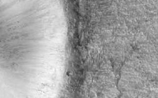 <h1>PIA02093:  Detail of an Impact Crater, Acidalia Planitia</h1><div class="PIA02093" lang="en" style="width:252px;text-align:left;margin:auto;background-color:#000;padding:10px;max-height:150px;overflow:auto;"><p><br>Click <a href="/figures/moc2_163a.jpg">here</a> to view a full res version of MOC2_163a.</p><p>This pair of Mars Global Surveyor (MGS) Mars Orbiter Camera (MOC) images shows the eastern third of a 4 kilometer-diameter impact crater located in Acidalia Planitia. The picture on the left is a MOC red wide angle camera context frame. It was taken at the same time as the narrow angle (i.e., high-resolution) camera image (right). Impact craters form by the sudden release of energy when an asteroid slams into a planet's surface at many miles per second. The high resolution MOC view (right) shows the walls, raised rim, and ejecta material thrown out of the crater during this blast. Similar features are seen at the famous Meteor Crater in northern Arizona, U.S.A.--except that this martian example is about 4 times larger than the one in North America. In this example, faint radial and concentric ridges and cracks in the crater ejecta are believed to arise from the motion of ejected material in a manner similar to thick pancake batter flowing across the surface.</p><p>The wide angle view (left) shows that many of the craters in Acidalia Planitia have a bright streak formed by wind transport of dust or sand. The narrow angle image (right) covers the full field of view of the MOC narrow angle camera--i.e., an area that is 3 kilometers (1.9 miles) wide. Both images are illuminated from the left/lower left. The images were acquired on July 15, 1999. The crater is located at 34.3°N latitude, 42.9°W longitude.</p><p>Malin Space Science Systems and the California Institute of Technology built the MOC using spare hardware from the Mars Observer mission. MSSS operates the camera from its facilities in San Diego, CA. The Jet Propulsion Laboratory's Mars Surveyor Operations Project operates the Mars Global Surveyor spacecraft with its industrial partner, Lockheed Martin Astronautics, from facilities in Pasadena, CA and Denver, CO.<br /><br /><a href="http://photojournal.jpl.nasa.gov/catalog/PIA02093" onclick="window.open(this.href); return false;" title="Voir l'image 	 PIA02093:  Detail of an Impact Crater, Acidalia Planitia	  sur le site de la NASA">Voir l'image 	 PIA02093:  Detail of an Impact Crater, Acidalia Planitia	  sur le site de la NASA.</a></div>