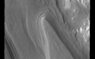 <h1>PIA02153:  Polar Layers</h1><div class="PIA02153" lang="en" style="width:414px;text-align:left;margin:auto;background-color:#000;padding:10px;max-height:150px;overflow:auto;"><p><a href="/figures/PIA02153_fig1.jpg"></a><br><b>Context image for PIA02153<br />Polar Layers</b></p><p>This image of the south polar region shows layered material. It is not known if the layers are formed yearly or if they form over the period of 10s to 100s of years or more.<p>Image information: VIS instrument. Latitude -80.3N, Longitude 296.2E. 17 meter/pixel resolution.</p><p>Note: this THEMIS visual image has not been radiometrically nor geometrically calibrated for this preliminary release. An empirical correction has been performed to remove instrumental effects. A linear shift has been applied in the cross-track and down-track direction to approximate spacecraft and planetary motion. Fully calibrated and geometrically projected images will be released through the Planetary Data System in accordance with Project policies at a later time.</p><p>NASA's Jet Propulsion Laboratory manages the 2001 Mars Odyssey mission for NASA's Office of Space Science, Washington, D.C. The Thermal Emission Imaging System (THEMIS) was developed by Arizona State University, Tempe, in collaboration with Raytheon Santa Barbara Remote Sensing. The THEMIS investigation is led by Dr. Philip Christensen at Arizona State University. Lockheed Martin Astronautics, Denver, is the prime contractor for the Odyssey project, and developed and built the orbiter. Mission operations are conducted jointly from Lockheed Martin and from JPL, a division of the California Institute of Technology in Pasadena.</p><br /><br /><a href="http://photojournal.jpl.nasa.gov/catalog/PIA02153" onclick="window.open(this.href); return false;" title="Voir l'image 	 PIA02153:  Polar Layers	  sur le site de la NASA">Voir l'image 	 PIA02153:  Polar Layers	  sur le site de la NASA.</a></div>