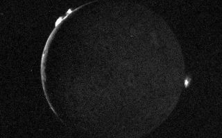 <h1>PIA02254:  Io - crescent with plumes</h1><div class="PIA02254" lang="en" style="width:505px;text-align:left;margin:auto;background-color:#000;padding:10px;max-height:150px;overflow:auto;">Voyager 2 took this picture of Io July 10, 1979, from a range of 1.2 million kilometers (750,000 miles). It was one of the last of an extensive sequence of "volcano watch" pictures planned as a time lapse study of the nearest of Jupiter's Galilean satellites. The sunlit crescent of Io is seen at the left, and the night side illuminated by light reflected from Jupiter can also be seen. Three volcanic eruption plumes are visible on the limb. All three were previously seen by Voyager 1. On the bright limb Plume 5 (upper) and Plume 6 (lower) are about 100 kilometers high, while Plume 2 on the dark limb is about 185 kilometers high and 325 kilometers wide. The dimensions of Plume 2 are about 1 1/2 times greater than during the Voyager 1 encounter, indicating that the intensity of the eruptions has increased during the four-month time interval between the Voyager encounters. The three volcanic eruptions and at least three others have apparently been active at roughly the same intensity or greater for a period of at least four months.<br /><br /><a href="http://photojournal.jpl.nasa.gov/catalog/PIA02254" onclick="window.open(this.href); return false;" title="Voir l'image 	 PIA02254:  Io - crescent with plumes	  sur le site de la NASA">Voir l'image 	 PIA02254:  Io - crescent with plumes	  sur le site de la NASA.</a></div>