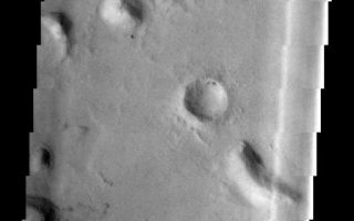 <h1>PIA02298:  Crater Variety</h1><div class="PIA02298" lang="en" style="width:512px;text-align:left;margin:auto;background-color:#000;padding:10px;max-height:150px;overflow:auto;"><p><a href="/figures/PIA02298_fig1.jpg"></a><br><b>Context image for PIA02298<br />Crater Variety</b></p><p>This image contains several different impact craters. The elongate depression near the top of the image is formed when more than one impactor hits at the same time (a double whammy). The large crater at the bottom formed in a single impact, but was subsequently filled with material that is now being removed.</p><p>Image information: VIS instrument. Latitude 13.5N, Longitude 167.2E. 36 meter/pixel resolution.</p><p>Please see the <a href="http://themis.asu.edu/terms" target="_blank">THEMIS Data Citation Note</a> for details on crediting THEMIS images. </p><p>Note: this THEMIS visual image has not been radiometrically nor geometrically calibrated for this preliminary release. An empirical correction has been performed to remove instrumental effects. A linear shift has been applied in the cross-track and down-track direction to approximate spacecraft and planetary motion. Fully calibrated and geometrically projected images will be released through the Planetary Data System in accordance with Project policies at a later time.</p><p>NASA's Jet Propulsion Laboratory manages the 2001 Mars Odyssey mission for NASA's Office of Space Science, Washington, D.C. The Thermal Emission Imaging System (THEMIS) was developed by Arizona State University, Tempe, in collaboration with Raytheon Santa Barbara Remote Sensing. The THEMIS investigation is led by Dr. Philip Christensen at Arizona State University. Lockheed Martin Astronautics, Denver, is the prime contractor for the Odyssey project, and developed and built the orbiter. Mission operations are conducted jointly from Lockheed Martin and from JPL, a division of the California Institute of Technology in Pasadena.</p><br /><br /><a href="http://photojournal.jpl.nasa.gov/catalog/PIA02298" onclick="window.open(this.href); return false;" title="Voir l'image 	 PIA02298:  Crater Variety	  sur le site de la NASA">Voir l'image 	 PIA02298:  Crater Variety	  sur le site de la NASA.</a></div>