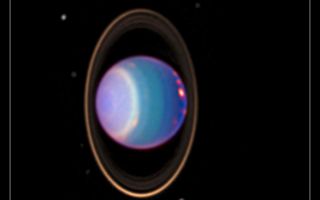 <h1>PIA02963:  Hubble Finds Many Bright Clouds on Uranus</h1><div class="PIA02963" lang="en" style="width:800px;text-align:left;margin:auto;background-color:#000;padding:10px;max-height:150px;overflow:auto;"><p>A recent Hubble Space Telescope view reveals Uranus surrounded by its four major rings and by 10 of its 17 known satellites. This false-color image was generated by Erich Karkoschka using data taken on August 8, 1998, with Hubble's Near Infrared Camera and Multi-Object Spectrometer. Hubble recently found about 20 clouds—nearly as many clouds on Uranus as the previous total in the history of modern observations.</p><p>The Wide Field/Planetary Camera 2 was developed by the Jet Propulsion Laboratory and managed by the Goddard Space Flight Center for NASA's Office of Space Science.</p><p>This image and other images and data received from the Hubble Space Telescope are posted on the World Wide Web on the Space Telescope Science Institute home page at URL <a href="http://oposite.stsci.edu/" class="external free" target="wpext">http://oposite.stsci.edu/</a>.<br /><br /><a href="http://photojournal.jpl.nasa.gov/catalog/PIA02963" onclick="window.open(this.href); return false;" title="Voir l'image 	 PIA02963:  Hubble Finds Many Bright Clouds on Uranus	  sur le site de la NASA">Voir l'image 	 PIA02963:  Hubble Finds Many Bright Clouds on Uranus	  sur le site de la NASA.</a></div>