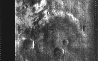 <h1>PIA02980:  Atlantis Region on Mars - Mariner 4</h1><div class="PIA02980" lang="en" style="width:479px;text-align:left;margin:auto;background-color:#000;padding:10px;max-height:150px;overflow:auto;">Eleventh picture of Mars from Mariner 4 (in "raw" state) taken through the green filter from 7800 miles away showing a crater 75 miles in diameter in the Atlantis region.<p>Mariner 4 was the first spacecraft to get a close look at Mars. Flying as close as 9,846 kilometers (6,118 miles), Mariner 4 revealed Mars to have a cratered, rust-colored surface, with signs on some parts of the planet that liquid water had once etched its way into the soil.<p>Mariner 4 was launched on November 28, 1964 and arrived at Mars on July 14, 1965.<br /><br /><a href="http://photojournal.jpl.nasa.gov/catalog/PIA02980" onclick="window.open(this.href); return false;" title="Voir l'image 	 PIA02980:  Atlantis Region on Mars - Mariner 4	  sur le site de la NASA">Voir l'image 	 PIA02980:  Atlantis Region on Mars - Mariner 4	  sur le site de la NASA.</a></div>