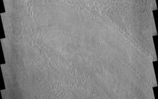 <h1>PIA03191:  Surface Texture</h1><div class="PIA03191" lang="en" style="width:383px;text-align:left;margin:auto;background-color:#000;padding:10px;max-height:150px;overflow:auto;"><p><a href="/figures/PIA03191_fig1.jpg"></a><br><b>Context image for PIA03191<br />Surface Texture </b></p><p>Now that all the frost is gone, the south polar region is exhibiting more than just layering and surface markings. As this image shows, the polar surface is not smooth at this resolution.</p><p>Image information: VIS instrument. Latitude 85.9S, Longitude 192.5E. 17 meter/pixel resolution.</p><p>Note: this THEMIS visual image has not been radiometrically nor geometrically calibrated for this preliminary release. An empirical correction has been performed to remove instrumental effects. A linear shift has been applied in the cross-track and down-track direction to approximate spacecraft and planetary motion. Fully calibrated and geometrically projected images will be released through the Planetary Data System in accordance with Project policies at a later time.</p><p>NASA's Jet Propulsion Laboratory manages the 2001 Mars Odyssey mission for NASA's Office of Space Science, Washington, D.C. The Thermal Emission Imaging System (THEMIS) was developed by Arizona State University, Tempe, in collaboration with Raytheon Santa Barbara Remote Sensing. The THEMIS investigation is led by Dr. Philip Christensen at Arizona State University. Lockheed Martin Astronautics, Denver, is the prime contractor for the Odyssey project, and developed and built the orbiter. Mission operations are conducted jointly from Lockheed Martin and from JPL, a division of the California Institute of Technology in Pasadena.</p><br /><br /><a href="http://photojournal.jpl.nasa.gov/catalog/PIA03191" onclick="window.open(this.href); return false;" title="Voir l'image 	 PIA03191:  Surface Texture	  sur le site de la NASA">Voir l'image 	 PIA03191:  Surface Texture	  sur le site de la NASA.</a></div>