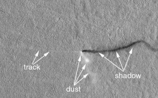 <h1>PIA03223:  A Mid-Summer's Dust Devil</h1><div class="PIA03223" lang="en" style="width:512px;text-align:left;margin:auto;background-color:#000;padding:10px;max-height:150px;overflow:auto;"><p>One objective for the Mars Global Surveyor (MGS) Mars Orbiter Camera (MOC) in the Extended Mission is to continue looking for changes and dynamic events taking place on the red planet. The feature shown here elicited gasps of excitement among the MOC Operations Staff when it was received in early April 2001.<p>The feature is a dust devil. Dust devils are spinning, columnar vortices of wind that move across the landscape, pick up dust, and look somewhat like miniature tornadoes. Dust devils are a common occurrence in dry and desert landscapes on Earth as well as Mars. When this dust devil was spied in Amazonis Planitia on April 10th, the MOC was looking straight down. Usually when the camera is looking down the dust devil will appear as a circular, fuzzy patch with a straight shadow indicating its columnar shape. In this case, however, the dust devil is somewhat curved and kinked--its shape is best seen in the shadow it casts to the right. A thin, light-toned track has been left by the dust devil as it moved eastward across the landscape. Usually, such tracks are darker than the surroundings, in this case the light tone might indicate that the dust being removed by the passing dust devil is darker than the surface underneath the thin veneer of dust.<p>Dust devils most typically form when the ground heats up during the day, warming the air immediately above the surface. As the warmed air nearest the surface begins to rise, it spins. The spinning column begins to move across the surface and picks up loose dust (if any is present). The dust makes the vortex visible and gives it the "dust devil" or tornado-like appearance. This dust devil occurred at an optimal time for dust devils whether on Earth or Mars--around 2 p.m. local time in the middle of Northern Hemisphere Summer. North is up, sunlight illuminates the scene from the left (west), and 500 meters is about 547 yards. The shadow cast by the dust devil goes off the edge of the image, but the length shown here (about 1.5 km) indicates that the dust devil was a bit more than 1 km (0.62 mi) in height.<br /><br /><a href="http://photojournal.jpl.nasa.gov/catalog/PIA03223" onclick="window.open(this.href); return false;" title="Voir l'image 	 PIA03223:  A Mid-Summer's Dust Devil	  sur le site de la NASA">Voir l'image 	 PIA03223:  A Mid-Summer's Dust Devil	  sur le site de la NASA.</a></div>