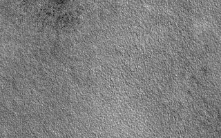 <h1>PIA03262:  Buried Craters</h1><div class="PIA03262" lang="en" style="width:512px;text-align:left;margin:auto;background-color:#000;padding:10px;max-height:150px;overflow:auto;"><p>26 December 2005<br />This Mars Global Surveyor (MGS) Mars Orbiter Camera (MOC) image shows two circular features on the plains of northern Utopia. A common sight on the martian northern plains, these rings indicate the locations of buried impact craters.</p><p>Location near: 65.1°N, 261.2°W <br />Image width: ~2 km (~1.2 mi) <br />Illumination from: lower left <br />Season: Northern Summer </p><br /><br /><a href="http://photojournal.jpl.nasa.gov/catalog/PIA03262" onclick="window.open(this.href); return false;" title="Voir l'image 	 PIA03262:  Buried Craters	  sur le site de la NASA">Voir l'image 	 PIA03262:  Buried Craters	  sur le site de la NASA.</a></div>