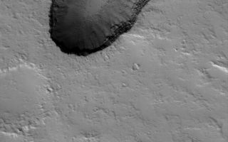 <h1>PIA03265:  Ascraeus Depression</h1><div class="PIA03265" lang="en" style="width:619px;text-align:left;margin:auto;background-color:#000;padding:10px;max-height:150px;overflow:auto;"><p>29 December 2005<br />This Mars Global Surveyor (MGS) Mars Orbiter Camera (MOC) image shows house-sized boulders and layered volcanic rock exposed in a pit on the north flank of the giant Tharsis volcano, Ascraeus Mons. The pit most likely formed by collapse. Dust mantles much of the surrounding terrain and the pit floor.</p><p>Location near: 12.9°N, 101.6°W <br />Image width: ~3 km (~1.9 mi) <br />Illumination from: lower left <br />Season: Southern Winter </p><br /><br /><a href="http://photojournal.jpl.nasa.gov/catalog/PIA03265" onclick="window.open(this.href); return false;" title="Voir l'image 	 PIA03265:  Ascraeus Depression	  sur le site de la NASA">Voir l'image 	 PIA03265:  Ascraeus Depression	  sur le site de la NASA.</a></div>