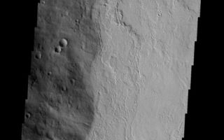 <h1>PIA03282:  Tharsis Tholus</h1><div class="PIA03282" lang="en" style="width:569px;text-align:left;margin:auto;background-color:#000;padding:10px;max-height:150px;overflow:auto;"><p><a href="/figures/PIA03282_fig1.jpg"></a><br><b>Context image for PIA03282<br />Tharsis Tholus</b></p><p>The eastern margin of Tharsis Tholus is visible on the left side of this image.</p><p>Image information: VIS instrument. Latitude 12.8N, Longitude 270.3E. 18 meter/pixel resolution.</p><p>Note: this THEMIS visual image has not been radiometrically nor geometrically calibrated for this preliminary release. An empirical correction has been performed to remove instrumental effects. A linear shift has been applied in the cross-track and down-track direction to approximate spacecraft and planetary motion. Fully calibrated and geometrically projected images will be released through the Planetary Data System in accordance with Project policies at a later time.</p><p>NASA's Jet Propulsion Laboratory manages the 2001 Mars Odyssey mission for NASA's Office of Space Science, Washington, D.C. The Thermal Emission Imaging System (THEMIS) was developed by Arizona State University, Tempe, in collaboration with Raytheon Santa Barbara Remote Sensing. The THEMIS investigation is led by Dr. Philip Christensen at Arizona State University. Lockheed Martin Astronautics, Denver, is the prime contractor for the Odyssey project, and developed and built the orbiter. Mission operations are conducted jointly from Lockheed Martin and from JPL, a division of the California Institute of Technology in Pasadena.</p><br /><br /><a href="http://photojournal.jpl.nasa.gov/catalog/PIA03282" onclick="window.open(this.href); return false;" title="Voir l'image 	 PIA03282:  Tharsis Tholus	  sur le site de la NASA">Voir l'image 	 PIA03282:  Tharsis Tholus	  sur le site de la NASA.</a></div>