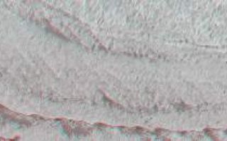 <h1>PIA03472:  Stereo View of Layer Outcrops in Iani Chaos</h1><div class="PIA03472" lang="en" style="width:800px;text-align:left;margin:auto;background-color:#000;padding:10px;max-height:150px;overflow:auto;"><p>In an effort to save fuel so that the Mars Global Surveyor (MGS) mission can be extended additional years into the future (in order to act as a relay for entry, descent, and landing telemetry from the Mars Exploration Rover mission in early 2004), the spacecraft was re-oriented in mid-August 2001 such that it no longer points the camera and other science instruments straight down at Mars (i.e., towards its nadir). Now it points about 16° off-nadir. For the Mars Orbiter Camera (MOC) experiment, this new orientation, known among MGS teams as "Relay-16" (because it enables the "relay mission" and has an offset of 16°), has resulted in a tremendous increase in the number of opportunities to acquire high resolution stereo (3-D) views of the martian surface. Ideally, an image taken during the Mapping Mission when the spacecraft was pointing nadir is repeated within a week or two of its first Mars anniversary--i.e., 1 Mars year after it was first acquired--so that the illumination conditions are close to the same in the two images.<p>The 3-D anaglyph shown here is an example of the on-going effort to acquire rRelay-16 stereo during the MGS Extended Mission. The first picture used to make this image, M13-01484, was acquired March 21, 2000. Nearly 1 Mars year later, the second image, E12-02584, was taken on January 23, 2002. Together, the images show eroded, pitted, light-toned layer outcrops in Iani Chaos near 4.4°S, 18.6°W. The layered materials may be ancient sedimentary rocks. The image covers an area 26 km (16 miles) by nearly 3 km (1.9 mi) wide, and is illuminated from the top left.<p>To see this image in stereo vision, you must use "3-D" glasses (red in left eye, blue in right). To see the original image from March 2000, visit<a href="http://www.msss.com/moc_gallery/m13_m18/images/M13/M1301484.html">M13-01484</a> in the MOC Gallery.<p>Malin Space Science Systems and the California Institute of Technology built the MOC using spare hardware from the Mars Observer mission. MSSS operates the camera from its facilities in San Diego, CA. The Jet Propulsion Laboratory's Mars Surveyor Operations Project operates the Mars Global Surveyor spacecraft with its industrial partner, Lockheed Martin Astronautics, from facilities in Pasadena, CA and Denver, CO.<br /><br /><a href="http://photojournal.jpl.nasa.gov/catalog/PIA03472" onclick="window.open(this.href); return false;" title="Voir l'image 	 PIA03472:  Stereo View of Layer Outcrops in Iani Chaos	  sur le site de la NASA">Voir l'image 	 PIA03472:  Stereo View of Layer Outcrops in Iani Chaos	  sur le site de la NASA.</a></div>