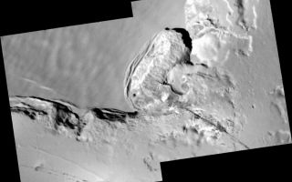 <h1>PIA03528:  Collapsing Cliff at Telegonus Mensa, Io</h1><div class="PIA03528" lang="en" style="width:800px;text-align:left;margin:auto;background-color:#000;padding:10px;max-height:150px;overflow:auto;"><p>These images of an area called Telegonus Mensa on Jupiter's moon Io, taken by NASA's Galileo spacecraft on Oct. 16, 2001, reveal a complex interplay of geologic processes.</p><p>Four small, high-resolution frames (9.6 meters, or 32 feet, per picture element) have been set into the larger context mosaic, which has a resolution of 42 meters (140 feet) per picture element. The illumination is from the upper right and north is to the top of the mosaic.</p><p>A fracture runs northwest from the lower right corner of the mosaic into the amphitheater in the center of the frame. A high-resolution image along this fracture reveals that lava has erupted from it.</p><p>The amphitheater itself is the site of extensive erosion, as the cliff has slumped southeastward under the influence of Io's gravity. High-resolution frames directly south of the amphitheater show another slumping cliff in detail. Flat tops of massive slump blocks—up to 6 kilometers (3.7 miles) long and 0.5 kilometers (0.3 miles) across—are illuminated by the Sun and cast shadows down the face of the cliff. Based on these shadows, Galileo scientists estimate that the cliff is 1 to 2 kilometers (3300 to 6600 feet) high. Just to the left of center a series of landslides can be seen, the longest of which extends 4 kilometers (2.5 miles).</p><p>The mosaic is centered at 21.45 degrees south latitude and 124.8 degrees west longitude and is 67 kilometers (42 miles) across.</p><p>The Jet Propulsion Laboratory, a division of the California Institute of Technology in Pasadena, manages the Galileo mission for NASA's Office of Space Science, Washington, D.C. Additional information about Galileo and its discoveries is available on the Galileo mission home page at <a href="http://galileo.jpl.nasa.gov" class="external free" target="wpext">http://galileo.jpl.nasa.gov</a>. Background information and educational context for the images can be found at <a href="http://solarsystem.nasa.gov/galileo/gallery/index.cfm" class="external free" target="wpext">http://solarsystem.nasa.gov/galileo/gallery/index.cfm</a>.<br /><br /><a href="http://photojournal.jpl.nasa.gov/catalog/PIA03528" onclick="window.open(this.href); return false;" title="Voir l'image 	 PIA03528:  Collapsing Cliff at Telegonus Mensa, Io	  sur le site de la NASA">Voir l'image 	 PIA03528:  Collapsing Cliff at Telegonus Mensa, Io	  sur le site de la NASA.</a></div>