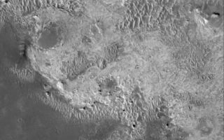 <h1>PIA03589:  Light-toned Rocks</h1><div class="PIA03589" lang="en" style="width:586px;text-align:left;margin:auto;background-color:#000;padding:10px;max-height:150px;overflow:auto;"><p>23 November 2005<br />This Mars Global Surveyor (MGS) Mars Orbiter Camera (MOC) image shows light-toned rock outcrops in northeastern Sinus Meridiani. The entire northern Sinus Meridiani region has vast exposures of light-toned, layered rock, covering an area many times greater than that of all the famous sandstone, limestone, and shale outcrops of northern Arizona and southeastern Utah. The rocks in this image are probably similar to those explored by the Mars Exploration Rover, Opportunity, but probably are of a different age and position in the region's geologic history.</p><p>MGS MOC and Mars Odyssey THEMIS images were recently used to describe the complex geology of the Sinus Meridiani region, as detailed in the open access <a href="http://www.marsjournal.org/">Mars</a> journal article, "The sedimentary rocks of Sinus Meridiani: Five key observations from data acquired by the Mars Global Surveyor and Mars Odyssey orbiters," by Malin Space Science Systems' K. S. Edgett. The paper is available at: <a href="http://dx.doi.org/10.1555/mars.2005.0002">doi:10.1555/mars.2005.0002</a>.<p>Location near: 0.3°S, 356.0°W <br />Image width: width: ~3 km (~1.9 mi)<br />Illumination from: lower left <br />Season: Southern Summer </p><br /><br /><a href="http://photojournal.jpl.nasa.gov/catalog/PIA03589" onclick="window.open(this.href); return false;" title="Voir l'image 	 PIA03589:  Light-toned Rocks	  sur le site de la NASA">Voir l'image 	 PIA03589:  Light-toned Rocks	  sur le site de la NASA.</a></div>