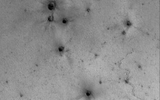 <h1>PIA03655:  Secondaries near Cerberus</h1><div class="PIA03655" lang="en" style="width:738px;text-align:left;margin:auto;background-color:#000;padding:10px;max-height:150px;overflow:auto;"><p>7 January 2006<br />This Mars Global Surveyor (MGS) Mars Orbiter Camera (MOC) image shows a field of small craters formed by secondary debris thrown from a larger meteoritic impact on the plains south of the Cerberus region.</p><p>Location near: 2.3°N, 195.7°W <br />Image width: ~3 km (~1.9 mi) <br />Illumination from: lower left <br />Season: Northern Winter </p><br /><br /><a href="http://photojournal.jpl.nasa.gov/catalog/PIA03655" onclick="window.open(this.href); return false;" title="Voir l'image 	 PIA03655:  Secondaries near Cerberus	  sur le site de la NASA">Voir l'image 	 PIA03655:  Secondaries near Cerberus	  sur le site de la NASA.</a></div>