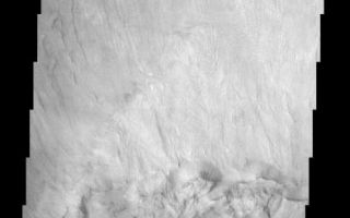 <h1>PIA03759:  Ganges Chasma Landslide</h1><div class="PIA03759" lang="en" style="width:487px;text-align:left;margin:auto;background-color:#000;padding:10px;max-height:150px;overflow:auto;"><br>(Released 01 April 2002)<br>This image shows a spectacular landslide along a portion of the southern wall of Ganges Chasma within Valles Marineris. Landslides have very characteristic morphologies on Earth, which they also display on Mars. These morphologies include a distinctive escarpment at the uppermost part of the landslide--called a head scarp (seen at the bottom of this image), a down-dropped block of material below that escarpment that dropped almost vertically, and a deposit of debris that moved away from the escarpment at high speed. In this example, the wall rock displayed in the upper part of the cliff is layered, with spurs and chutes created by differing amounts of erosion. Below the steep scarp is a smoother, steep slope of material with small, narrow tongues of debris that have eroded off of the escarpment since the landslide occurred (a talus slope). The actual landslide deposit, visible in the upper half of this image, shows striations that form by differences in the side-by-side motion during high velocity emplacement. This immense landslide traveled some 70 km at speeds that probably exceeded 100 kilometers per hour (60 miles per hour) before coming to rest, forming abrupt, terminal fronts (upper right corner of image). Even at these high speeds, this massive landslide was moving for nearly an hour before it came to rest.<br /><br /><a href="http://photojournal.jpl.nasa.gov/catalog/PIA03759" onclick="window.open(this.href); return false;" title="Voir l'image 	 PIA03759:  Ganges Chasma Landslide	  sur le site de la NASA">Voir l'image 	 PIA03759:  Ganges Chasma Landslide	  sur le site de la NASA.</a></div>