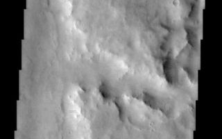 <h1>PIA03762:  Naktong Valles</h1><div class="PIA03762" lang="en" style="width:488px;text-align:left;margin:auto;background-color:#000;padding:10px;max-height:150px;overflow:auto;"><br>(Released 04 April 2002)<br>This image is located in a cratered highland region called Arabia Terra. The center right side of the image shows a branch of the valley network Naktong Vallis cutting into the eastern rim of an unnamed crater. A simple sequence of geologic events can be ascertained from this image. Early on in time this surface was subjected to bombardment from asteroids and comets thereby creating the pockmarked highlands. This was followed by channel incision into the former rim of the large crater seen near the center of this image. The last series of events to occur in this image are primarily aeolian (wind) related. These include the dark streaks seen on slopes. Numerous dark streaks coursing down the slopes of crater and channel walls suggests that the relatively bright dust which mantles the slopes slides downhill and either exposes a dust-free darker surface or creates a darker surface by increasing its roughness.<br /><br /><a href="http://photojournal.jpl.nasa.gov/catalog/PIA03762" onclick="window.open(this.href); return false;" title="Voir l'image 	 PIA03762:  Naktong Valles	  sur le site de la NASA">Voir l'image 	 PIA03762:  Naktong Valles	  sur le site de la NASA.</a></div>