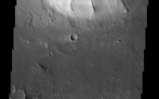 <h1>PIA03792:  Kasei Valles</h1><div class="PIA03792" lang="en" style="width:480px;text-align:left;margin:auto;background-color:#000;padding:10px;max-height:150px;overflow:auto;"><br>(Released 9 May 2002)<br>Kasei Valles (Kasei is the Japanese word for Mars) is one of the largest outflow channels on Mars. Kasei Valles stretches some 2,000 km across the face of Mars and empties into the Chryse basin. This THEMIS image is of the northern branch of Kasei Valles and shows the channel floor and northern channel wall. The plateau surface located at the top of this image is more heavily cratered than the channel floor which indicates that the plateau is older than the channel floor. The wall of the plateau has spur and gully topography present. The floor of the channel has evidence of fluvial scour including a smaller inner channel. These features were probably carved out during waning stage flow. The probable causes of Martian floods are massive releases of subsurface water/ice due to possible subsurface volcanic activity. Martian outflow channels begin at point sources (chaotic terrain and box canyons) and then flow unconfined into a basin region.<br /><br /><a href="http://photojournal.jpl.nasa.gov/catalog/PIA03792" onclick="window.open(this.href); return false;" title="Voir l'image 	 PIA03792:  Kasei Valles	  sur le site de la NASA">Voir l'image 	 PIA03792:  Kasei Valles	  sur le site de la NASA.</a></div>