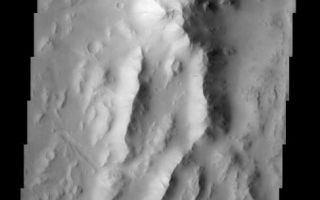<h1>PIA03794:  Reuyl Crater Dust Avalanches</h1><div class="PIA03794" lang="en" style="width:487px;text-align:left;margin:auto;background-color:#000;padding:10px;max-height:150px;overflow:auto;"><br>(Released 13 May 2002)<br><b>The Science</b><br>The rugged, arcuate rim of the 90 km crater Reuyl dominates this THEMIS image. Reuyl crater is at the southern edge of a region known to be blanketed in thick dust based on its high albedo (brightness) and low thermal inertia values. This thick mantle of dust creates the appearance of snow covered mountains in the image. Like snow accumulation on Earth, Martian dust can become so thick that it eventually slides down the face of steep slopes, creating runaway avalanches of dust. In the center of this image about 1/3 of the way down is evidence of this phenomenon. A few dozen dark streaks can be seen on the bright, sunlit slopes of the crater rim. The narrow streaks extend downslope following the local topography in a manner very similar to snow avalanches on Earth. But unlike their terrestrial counterparts, no accumulation occurs at the bottom. The dust particles are so small that they are easily launched into the thin atmosphere where they remain suspended and ultimately blow away. The apparent darkness of the avalanche scars is due to the presence of relatively dark underlying material that becomes exposed following the passage of the avalanche. Over time, new dust deposition occurs, brightening the scars until they fade into the background. Although dark slope streaks had been observed in Viking mission images, a clear understanding of this dynamic phenomenon wasn't possible until the much higher resolution images from the Mars Global Surveyor MOC camera revealed the details. MOC images also showed that new avalanches have occurred during the time MGS has been in orbit. THEMIS images will allow additional mapping of their distribution and frequency, contributing new insights about Martian dust avalanches.<br><br><b>The Story</b><br>The stiff peaks in this image might remind you of the Alps here on Earth, but they really outline the choppy edge of a large Martian crater over 50 miles wide (seen in the context image at right). While these aren't the Alps, you will find quite a few avalanches. Avalanches of dust, however, not snow. Martian dust can become so thick in this area that it eventually slides down the steep slopes, creating runaway avalanches of dust.<br><br>No dedicated, Swiss-like avalanche rescue teams would be needed much on Mars, however. Unlike snow, the dust doesn't pile up and accumulate at the bottom. Instead, dust particles are so small that they get launched into the atmosphere where they remain suspended until . . . poof! They are blown away and distributed lightly elsewhere.<br><br>For evidence of past avalanches, check out the dark streaks running down the bright, sunlit slopes (western side of the peaks about 1/3 of the way down the image). These avalanche scars are dark because the underlying surface is not as bright as the removed dust. Eventually, new dust will settle over these scars, and the streaks will brighten until they fade into the background.<br><br>The neat thing is that we'll be able to see all of these changes happening over time. Our current two Mars orbiters (called Mars Global Surveyor and 2001 Mars Odyssey) are showing that avalanche action is happening right now, all of the time on Mars. For example, the camera on Mars Global Surveyor has already taken pictures of the Martian surface in some areas that showed no avalanches - the first time the picture was snapped, that is. The next time around, the camera took a picture of the same area, only voila! New streaks, meaning new avalanches!<br><br>That's why it can be so exciting to look at the Martian landscape over time to see how it changes. The THEMIS camera on Odyssey will continue to map out the places where the avalanches occur and how often. This information will really help scientists understand how dust is works to shape the terrain and to influence the Martian climate as it constantly swings into the atmosphere, falls down to the ground, and rises back up again.<br><br>Stay tuned to see if you too can pick out the changes over time!<br /><br /><a href="http://photojournal.jpl.nasa.gov/catalog/PIA03794" onclick="window.open(this.href); return false;" title="Voir l'image 	 PIA03794:  Reuyl Crater Dust Avalanches	  sur le site de la NASA">Voir l'image 	 PIA03794:  Reuyl Crater Dust Avalanches	  sur le site de la NASA.</a></div>