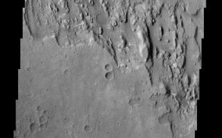 <h1>PIA03817:  Mars Surface Layers in Infrared</h1><div class="PIA03817" lang="en" style="width:480px;text-align:left;margin:auto;background-color:#000;padding:10px;max-height:150px;overflow:auto;"><br>(Released 29 May 2002)<br>Infrared imaging from NASA's Mars Odyssey spacecraft shows signs of layering exposed at the surface in a region of Mars called Terra Meridiani. The brightness levels show daytime surface temperatures, which range from about minus 20 degrees to zero degrees Celsius (minus 4 degrees to 32 degrees Fahrenheit). Many of the temperature variations are due to slope effects, with sun-facing slopes warmer than shaded slopes. However, several rock layers can be seen to have distinctly different temperatures, indicating that physical properties vary from layer to layer. These differences suggest that the environment on this part of Mars varied through time as these layers were formed. The image is a mosaic combining four exposures taken by the thermal emission imaging system aboard Odyssey during the first two months of the Odyssey mapping mission, which began in February 2002. The area shown is about 120 kilometers (75 miles) across, at approximately 358 degrees east (2 degrees west) longitude and 3 degrees north latitude.<br /><br /><a href="http://photojournal.jpl.nasa.gov/catalog/PIA03817" onclick="window.open(this.href); return false;" title="Voir l'image 	 PIA03817:  Mars Surface Layers in Infrared	  sur le site de la NASA">Voir l'image 	 PIA03817:  Mars Surface Layers in Infrared	  sur le site de la NASA.</a></div>