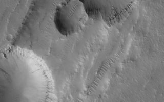 <h1>PIA04122:  Collapse Pits</h1><div class="PIA04122" lang="en" style="width:593px;text-align:left;margin:auto;background-color:#000;padding:10px;max-height:150px;overflow:auto;"><p>27 July 2005<br /> This Mars Global Surveyor (MGS) Mars Orbiter Camera (MOC) image shows a 1.5 meters per pixel (~5 ft/pixel) view of aligned pits formed by collapse along a fault trend in the Tractus Catena region of Mars, in northern Tharsis.</p><p>Location near: 32.2°N, 101.7°W <br />Image width: width: ~3 km (~1.9 mi) <br />Illumination from: lower left <br />Season: Northern Autumn </p><br /><br /><a href="http://photojournal.jpl.nasa.gov/catalog/PIA04122" onclick="window.open(this.href); return false;" title="Voir l'image 	 PIA04122:  Collapse Pits	  sur le site de la NASA">Voir l'image 	 PIA04122:  Collapse Pits	  sur le site de la NASA.</a></div>