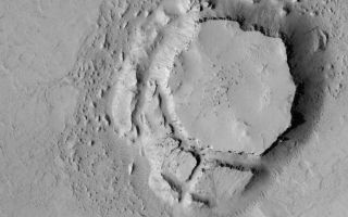 <h1>PIA04697:  Crumbled Mesa</h1><div class="PIA04697" lang="en" style="width:799px;text-align:left;margin:auto;background-color:#000;padding:10px;max-height:150px;overflow:auto;">MGS MOC Release No. MOC2-463, 25 August 2003<p />This Mars Global Surveyor (MGS) Mars Orbiter Camera (MOC) picture shows a mesa in the Avernus Colles region of Mars, near 3.9°S, 190.8°W. The mesa and the very large blocks that have been shed from its slopes are all that remain of a once much more extensive suite of layered rock that used to cover the entire area shown here. This full-resolution (1.5 meters--5 feet--per pixel) image covers an area 3 km (1.9 mi) across. Sunlight illuminates the scene from the left.<br /><br /><a href="http://photojournal.jpl.nasa.gov/catalog/PIA04697" onclick="window.open(this.href); return false;" title="Voir l'image 	 PIA04697:  Crumbled Mesa	  sur le site de la NASA">Voir l'image 	 PIA04697:  Crumbled Mesa	  sur le site de la NASA.</a></div>