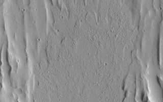 <h1>PIA04781:  Kasei Valles Flow</h1><div class="PIA04781" lang="en" style="width:800px;text-align:left;margin:auto;background-color:#000;padding:10px;max-height:150px;overflow:auto;">MGS MOC Release No. MOC2-503, 4 October 2003<p />This Mars Global Surveyor (MGS) Mars Orbiter Camera (MOC) picture shows the lobate fronts of a large flow or series of smaller flow features in Kasei Valles. The rubbly surface of the flow has been interpreted to suggest that this might have been a mud flow, rather than a lava flow, but final determination will someday require a person to visit this landform "in the field." This picture is illuminated from the right and covers an area approximately 8 km (5 miles) wide near 15.7°N, 77.7°W.<br /><br /><a href="http://photojournal.jpl.nasa.gov/catalog/PIA04781" onclick="window.open(this.href); return false;" title="Voir l'image 	 PIA04781:  Kasei Valles Flow	  sur le site de la NASA">Voir l'image 	 PIA04781:  Kasei Valles Flow	  sur le site de la NASA.</a></div>