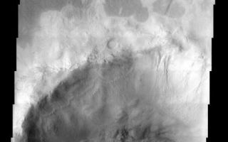<h1>PIA04948:  Icaria Planum</h1><div class="PIA04948" lang="en" style="width:455px;text-align:left;margin:auto;background-color:#000;padding:10px;max-height:150px;overflow:auto;"><p /><a href="/figures/PIA04948_context.jpg"></a><br /><p />Released 23 December 2003<p />An unnamed crater west of Icaria Planum hosts an even smaller crater with interesting features both inside and out. A strange pattern of light-toned surfaces appears to be associated with the ejecta of this crater. Within the crater, the ubiquitous high latitude "pasted on terrain" is evident along with gullies, a combination of features that tends to support the idea that the pasted-on material is dirty snow whose melting leads to the formation of gullies. Completing the ensemble of features are accumulations of dark sand within the rugged topography of the crater floor.<p />Image information: VIS instrument. Latitude -45.4, Longitude 248.2 East (111.8 West). 19 meter/pixel resolution.<p />Note: this THEMIS visual image has not been radiometrically nor geometrically calibrated for this preliminary release. An empirical correction has been performed to remove instrumental effects. A linear shift has been applied in the cross-track and down-track direction to approximate spacecraft and planetary motion. Fully calibrated and geometrically projected images will be released through the Planetary Data System in accordance with Project policies at a later time.<p />NASA's Jet Propulsion Laboratory manages the 2001 Mars Odyssey mission for NASA's Office of Space Science, Washington, D.C. The Thermal Emission Imaging System (THEMIS) was developed by Arizona State University, Tempe, in collaboration with Raytheon Santa Barbara Remote Sensing. The THEMIS investigation is led by Dr. Philip Christensen at Arizona State University. Lockheed Martin Astronautics, Denver, is the prime contractor for the Odyssey project, and developed and built the orbiter. Mission operations are conducted jointly from Lockheed Martin and from JPL, a division of the California Institute of Technology in Pasadena.<br /><br /><a href="http://photojournal.jpl.nasa.gov/catalog/PIA04948" onclick="window.open(this.href); return false;" title="Voir l'image 	 PIA04948:  Icaria Planum	  sur le site de la NASA">Voir l'image 	 PIA04948:  Icaria Planum	  sur le site de la NASA.</a></div>