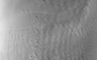 <h1>PIA05201:  Clouds near Phlegra Montes</h1><div class="PIA05201" lang="en" style="width:592px;text-align:left;margin:auto;background-color:#000;padding:10px;max-height:150px;overflow:auto;">14 January 2004<br />This Mars Global Surveyor (MGS) Mars Orbiter Camera (MOC) wide angle red image shows mid-winter, afternoon cloud patterns over the northern end of the Phlegra Montes near 46°N, 192°W. The image, acquired in December 2003, covers an area approximately 579 km (354 mi) wide; sunlight illuminates the scene from the lower left.<br /><br /><a href="http://photojournal.jpl.nasa.gov/catalog/PIA05201" onclick="window.open(this.href); return false;" title="Voir l'image 	 PIA05201:  Clouds near Phlegra Montes	  sur le site de la NASA">Voir l'image 	 PIA05201:  Clouds near Phlegra Montes	  sur le site de la NASA.</a></div>