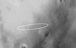 <h1>PIA05251:  Mars Exploration Rover (MER-B) Opportunity Landing Site</h1><div class="PIA05251" lang="en" style="width:799px;text-align:left;margin:auto;background-color:#000;padding:10px;max-height:150px;overflow:auto;"><a href="/figures/PIA05251_ellipse.jpg"></a><br /> Mosaic (Click on image for larger view) <br /><a href="/figures/PIA05251_wideangle.jpg"></a><br /> Wide Angle View (Click on image for larger view) <br /><a href="/figures/PIA05251_narrowangle.jpg"></a><br /> Narrow Angle View (Click on image for larger view) <p />24 January 2004 <br /> The second Mars Exploration Rover (MER-B), Opportunity, is set to land on Mars around 9:05 p.m. Pacific Standard Time today, 24 January 2004 (25 January 2004 UTC). Above are shown three perspectives on the Opportunity landing site, which is an ellipse in Meridiani Planum approximately 87 km (54 mi) long by 11 km (6.8 mi) wide. All images are oriented with north up and east to the right. The lander will be coming through the atmosphere from the west/southwest, roughly following the long axis of the ellipse. It is most likely to touch down somewhere near the center of the ellipse.<p />The first image (top) is a mosaic of MGS MOC and Mars Odyssey Thermal Emission Imaging System visible images (THEMIS-VIS). The THEMIS-VIS instrument provides pictures with a spatial resolution of 18 meters per pixel (~59 ft/pixel); the MOC images used in the mosaic have resolutions ranging from 1.4 m/pixel to 12 m/pixel. A total of 15 THEMIS-VIS images were used to form the background, on which 61 MOC high resolution images were mosaiced. These data were acquired over a period spanning parts of 3 Mars years between April 1999 through January 2004. These pictures were acquired not only in different years, but in different seasons, so the illumination angle, overall brightness, and patterns of ephemeral windblown dust and, in some cases, dark dust devil streaks, are different from image to image within the mosaic.<p />The second image (middle) is a Mars Global Surveyor (MGS) Mars Orbiter Camera (MOC) red wide angle view obtained in November 2003 as part of an on-going effort to monitor the weather at the landing site. The wide angle view provides a sense of the regional context. The third image (bottom) is a 1.8 m/pixel (6 ft/pixel) view near the center of the landing ellipse. It was also acquired by MOC in November 2003, and covers an area 3 km (1.9 mi) wide. The light-toned, somewhat circular features are believed to be either the location of ancient, buried, nearly-filled meteor impact craters or the eroded remains of craters that formed in bedrock that has long since been removed from the region.<p />The Opportunity landing site in Meridiani Planum was selected to provide access, it is hoped, to materials bearing the iron oxide mineral, hematite. Hematite was detected in this region by the Thermal Emission Spectrometer (TES) on MGS. This mineral is suspected of providing a clue that liquid water may have once played a role in the region. The dark-toned materials of Meridiani Planum cover a lighter-toned substrate that may consist of layered rock. Small ridges have formed in the dark material in some parts of the landing ellipse, but no one will know until the first images are returned, exactly what features will be present at the Opportunity site. One thing is certain: no previous Mars lander has ever gone to a setting like Meridiani Planum. The landscape is almost certain to be different than the Viking 1, Viking 2, Mars Pathfinder, and Spirit sites.<p />Sunlight illuminates the wide and narrow angle views, and each image in the mosaic, from the left. <a href="http://themis.asu.edu/">The THEMIS instrument is operated by a team at Arizona State University;</a> the <a href="http://www.msss.com/press_releases/vismoc/">THEMIS-VIS camera was built by Malin Space Science Systems (MSSS),</a> which also operates the MGS MOC. Opportunity will land in the mid-afternoon, local time, on Mars. At the same time, Mars Global Surveyor will pass over the site and listen for a transmission of Opportunity's entry, descent, and landing data. These data will be relayed back to Earth by the MOC. For more information about the Mars Exploration Rovers, visit <a href="http://marsweb.jpl.nasa.gov/">NASA/JPL's Mars Exploration Program Web site.</a> For more information about the work that Malin Space Science Systems and MGS MOC are doing in support of the rover missions, see: <a href="http://www.msss.com/mer_mission/">http://www.msss.com/mer_mission/</a>. For information about how MSSS will use this mosaic of the landing site to help find Opportunity after it touches down, see <a href="http://www.msss.com/mer_mission/finding_mer/">Finding MERs</a>. MER landing site weather reports are located at: <a href="http://www.msss.com/mars_images/moc/mer_weather/"> http://www.msss.com/mars_images/moc/mer_weather/. </a><br /><br /><a href="http://photojournal.jpl.nasa.gov/catalog/PIA05251" onclick="window.open(this.href); return false;" title="Voir l'image 	 PIA05251:  Mars Exploration Rover (MER-B) Opportunity Landing Site	  sur le site de la NASA">Voir l'image 	 PIA05251:  Mars Exploration Rover (MER-B) Opportunity Landing Site	  sur le site de la NASA.</a></div>