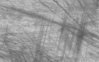 <h1>PIA05341:  Wind vs. Dust Devil Streaks</h1><div class="PIA05341" lang="en" style="width:800px;text-align:left;margin:auto;background-color:#000;padding:10px;max-height:150px;overflow:auto;">22 February 2004 <br /> This Mars Global Surveyor (MGS) Mars Orbiter Camera (MOC) image presents a fine illustration of the difference between streaks made by dust devils and streaks made by wind gusts. Dust devils are usually solitary, spinning vortices. They resemble a tornado, or the swirling motion of a familiar, Tasmanian cartoon character. Wind gusts, on the other hand, can cover a larger area and affect more terrain at the same time. The dark, straight, and parallel features resembling scrape marks near the right/center of this image are thought to have been formed by a singular gust of wind, whereas the more haphazard dark streaks that crisscross the scene were formed by dozens of individual dust devils, acting at different times. This southern summer image is located in Noachis Terra near 67.0°S, 316.2°W. Sunlight illuminates the scene from the upper left; the picture covers an area 3 km (1.9 mi) wide.<br /><br /><a href="http://photojournal.jpl.nasa.gov/catalog/PIA05341" onclick="window.open(this.href); return false;" title="Voir l'image 	 PIA05341:  Wind vs. Dust Devil Streaks	  sur le site de la NASA">Voir l'image 	 PIA05341:  Wind vs. Dust Devil Streaks	  sur le site de la NASA.</a></div>