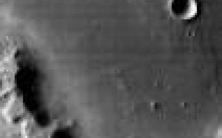 <h1>PIA05351:  Western Gusev in Infrared</h1><div class="PIA05351" lang="en" style="width:106px;text-align:left;margin:auto;background-color:#000;padding:10px;max-height:150px;overflow:auto;"><a href="/figures/PIA05351_context.jpg"></a><br /><p />Released 13 January 2004<p />Long before the MER landers were named or launched, the two orbiters at Mars were asked to examine landing sites. Both the Odyssey and Mars Global Surveyor spacecraft have been collecting landing site data for the past two years. The MGS and ODY data were used as part of the decision making process in the final selection of the two landing sites. The types of data collected by the two orbiters included not only images of the surface but also thermal data about the surface composition, atmospheric data about the climate at each location, and the tracking of major dust storms in the region prior to landing. The presence of, and data collected by, the MGS and ODY orbiters have proven invaluable in MER mission planning.<p />This image, the infrared counterpart to this <a href="/catalog/PIA05347">visual image</a>, covers the western side of Gusev crater.<p />Image information: IR instrument. Latitude -12.3, Longitude 175 East (185 West). 100 meter/pixel resolution.<p />Note: this THEMIS visual image has not been radiometrically nor geometrically calibrated for this preliminary release. An empirical correction has been performed to remove instrumental effects. A linear shift has been applied in the cross-track and down-track direction to approximate spacecraft and planetary motion. Fully calibrated and geometrically projected images will be released through the Planetary Data System in accordance with Project policies at a later time.<p />NASA's Jet Propulsion Laboratory manages the 2001 Mars Odyssey mission for NASA's Office of Space Science, Washington, D.C. The Thermal Emission Imaging System (THEMIS) was developed by Arizona State University, Tempe, in collaboration with Raytheon Santa Barbara Remote Sensing. The THEMIS investigation is led by Dr. Philip Christensen at Arizona State University. Lockheed Martin Astronautics, Denver, is the prime contractor for the Odyssey project, and developed and built the orbiter. Mission operations are conducted jointly from Lockheed Martin and from JPL, a division of the California Institute of Technology in Pasadena.<br /><br /><a href="http://photojournal.jpl.nasa.gov/catalog/PIA05351" onclick="window.open(this.href); return false;" title="Voir l'image 	 PIA05351:  Western Gusev in Infrared	  sur le site de la NASA">Voir l'image 	 PIA05351:  Western Gusev in Infrared	  sur le site de la NASA.</a></div>