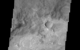 <h1>PIA05355:  Meridiani Planum</h1><div class="PIA05355" lang="en" style="width:519px;text-align:left;margin:auto;background-color:#000;padding:10px;max-height:150px;overflow:auto;"><a href="/figures/PIA05355_context.jpg"></a><br /><p />Released 19 January 2004<p />Long before the MER landers were named or launched, the two orbiters at Mars were asked to examine landing sites. Both the Odyssey and Mars Global Surveyor spacecraft have been collecting landing site data for the past two years. The MGS and ODY data were used as part of the decision making process in the final selection of the two landing sites. The types of data collected by the two orbiters included not only images of the surface but also thermal data about the surface composition, atmospheric data about the climate at each location, and the tracking of major dust storms in the region prior to landing. The presence of, and data collected by, the MGS and ODY orbiters have proven invaluable in MER mission planning.<p />This image, taken on 8 November 2003 (just 10 weeks ago), shows a section of Meridiani Planum. On January 24, the MER rover Opportunity should land in Meridiani Planum to research the hematite found by the <a href="http://tes.asu.edu/">Thermal Emission Spectrometer</a> onboard the Mars Global Surveyor orbiter.<p />Image information: VIS instrument. Latitude -4, Longitude 358.2 East (1.8 West). 19 meter/pixel resolution.<p />Note: this THEMIS visual image has not been radiometrically nor geometrically calibrated for this preliminary release. An empirical correction has been performed to remove instrumental effects. A linear shift has been applied in the cross-track and down-track direction to approximate spacecraft and planetary motion. Fully calibrated and geometrically projected images will be released through the Planetary Data System in accordance with Project policies at a later time.<p />NASA's Jet Propulsion Laboratory manages the 2001 Mars Odyssey mission for NASA's Office of Space Science, Washington, D.C. The Thermal Emission Imaging System (THEMIS) was developed by Arizona State University, Tempe, in collaboration with Raytheon Santa Barbara Remote Sensing. The THEMIS investigation is led by Dr. Philip Christensen at Arizona State University. Lockheed Martin Astronautics, Denver, is the prime contractor for the Odyssey project, and developed and built the orbiter. Mission operations are conducted jointly from Lockheed Martin and from JPL, a division of the California Institute of Technology in Pasadena.<br /><br /><a href="http://photojournal.jpl.nasa.gov/catalog/PIA05355" onclick="window.open(this.href); return false;" title="Voir l'image 	 PIA05355:  Meridiani Planum	  sur le site de la NASA">Voir l'image 	 PIA05355:  Meridiani Planum	  sur le site de la NASA.</a></div>