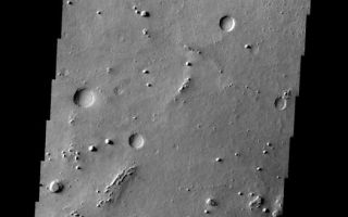 <h1>PIA05358:  Western Meridiani</h1><div class="PIA05358" lang="en" style="width:526px;text-align:left;margin:auto;background-color:#000;padding:10px;max-height:150px;overflow:auto;"><a href="/figures/PIA05358_context.jpg"></a><br /><p />Released 22 January 2004<p />Long before the MER landers were named or launched, the two orbiters at Mars were asked to examine landing sites. Both the Odyssey and Mars Global Surveyor spacecraft have been collecting landing site data for the past two years. The MGS and ODY data were used as part of the decision making process in the final selection of the two landing sites. The types of data collected by the two orbiters included not only images of the surface but also thermal data about the surface composition, atmospheric data about the climate at each location, and the tracking of major dust storms in the region prior to landing. The presence of, and data collected by, the MGS and ODY orbiters have proven invaluable in MER mission planning.<p />This image, collected on 16 January 2003, covers an area in Western Meridiani.<p />Image information: VIS instrument. Latitude 1.9, Longitude 354.7 East (5.3 West). 19 meter/pixel resolution.<p />Note: this THEMIS visual image has not been radiometrically nor geometrically calibrated for this preliminary release. An empirical correction has been performed to remove instrumental effects. A linear shift has been applied in the cross-track and down-track direction to approximate spacecraft and planetary motion. Fully calibrated and geometrically projected images will be released through the Planetary Data System in accordance with Project policies at a later time.<p />NASA's Jet Propulsion Laboratory manages the 2001 Mars Odyssey mission for NASA's Office of Space Science, Washington, D.C. The Thermal Emission Imaging System (THEMIS) was developed by Arizona State University, Tempe, in collaboration with Raytheon Santa Barbara Remote Sensing. The THEMIS investigation is led by Dr. Philip Christensen at Arizona State University. Lockheed Martin Astronautics, Denver, is the prime contractor for the Odyssey project, and developed and built the orbiter. Mission operations are conducted jointly from Lockheed Martin and from JPL, a division of the California Institute of Technology in Pasadena.<br /><br /><a href="http://photojournal.jpl.nasa.gov/catalog/PIA05358" onclick="window.open(this.href); return false;" title="Voir l'image 	 PIA05358:  Western Meridiani	  sur le site de la NASA">Voir l'image 	 PIA05358:  Western Meridiani	  sur le site de la NASA.</a></div>